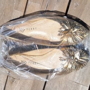 Katy Perry gold flats